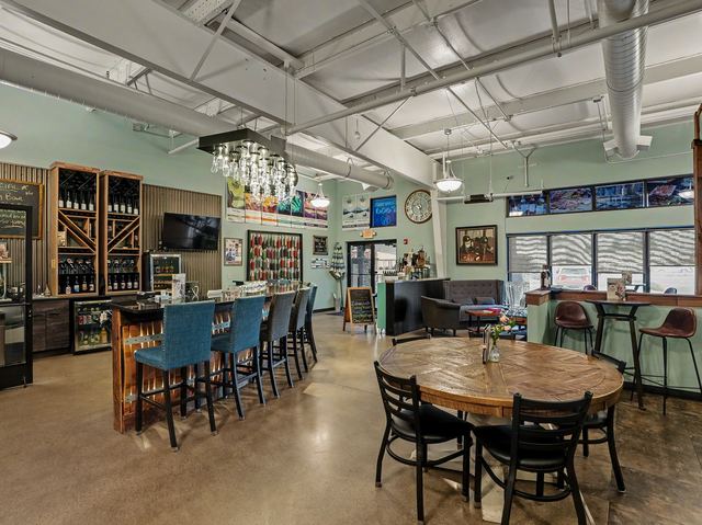 Wide view of the tasting room and bar