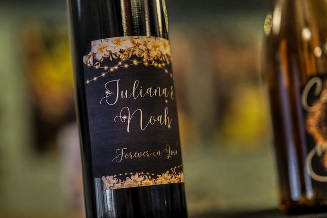 Custom labeled wine bottles for a wedding